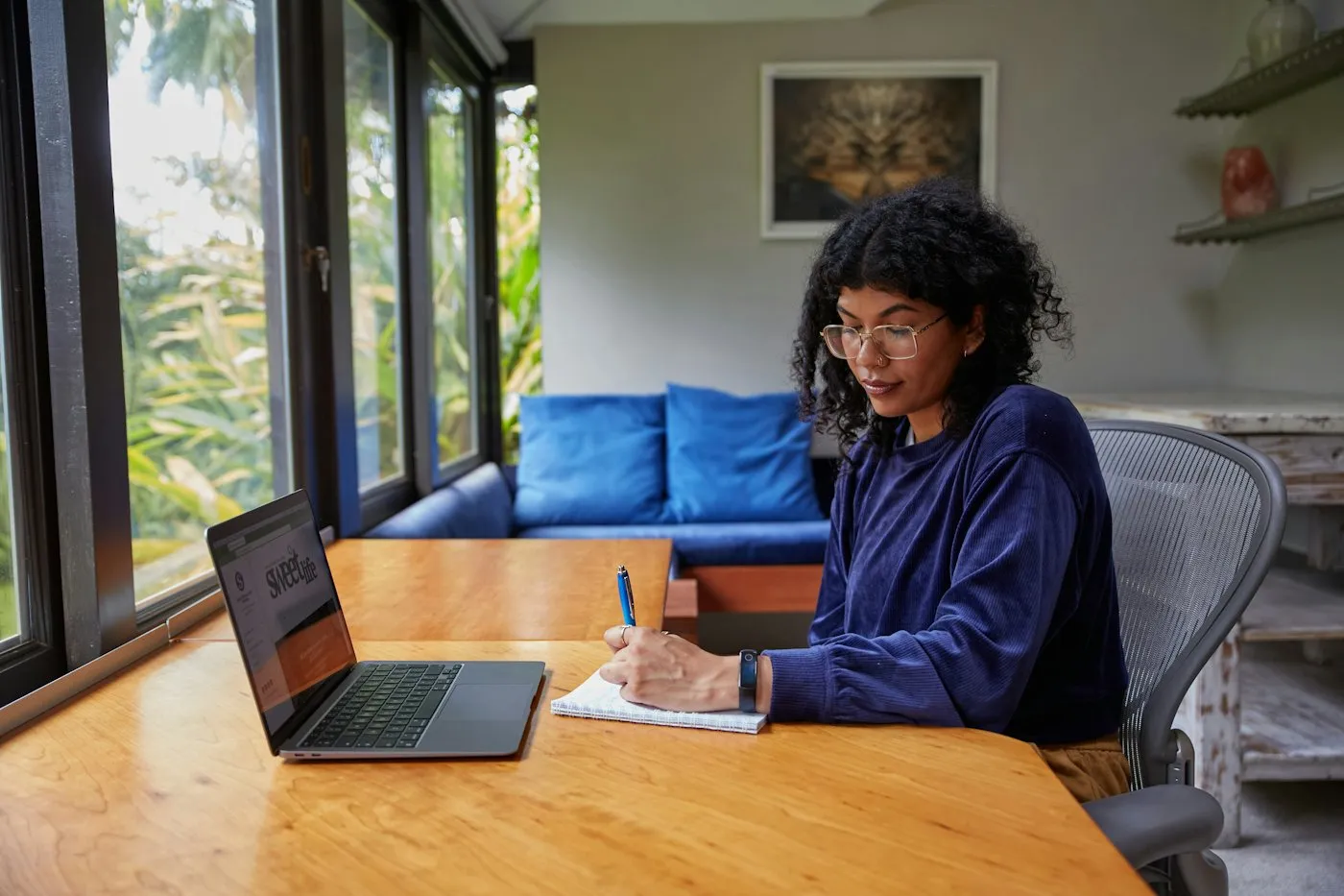 A founder working by a window
